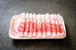 Fresh raw pork belly sliced photo