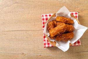 Deep-fried sliced potatoes stick with sesame - Thai food style photo