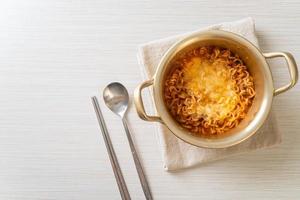 Korean spicy instant noodle with cheese photo