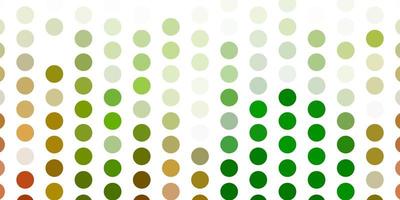 Light green, yellow vector background with spots.