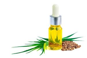 bottle with hemp oil, hemp leaf and seeds on white background, CBD oil hemp products, cannabis extract oil, Medical marijuana. photo