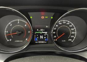 View of the visual instruments on the dashboard of a modern vehicle photo