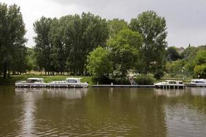 Houseboat cruise on the river Le Lot in France photo