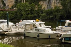 Houseboat cruise on the river Le Lot in France photo