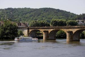 Houseboat cruise on the river Le Lot in France photo