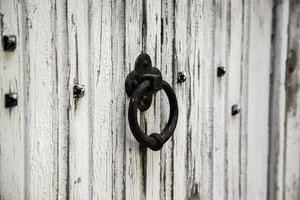Old metal door knocker photo