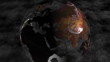 An earth globe rotates in front of a dark grey background - Loop video