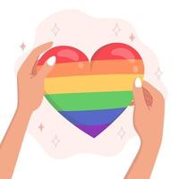 orgullo lgbtqi símbolo en forma de corazón en las manos vector