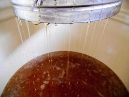 Background texture, dropping drops of sweet honey photo