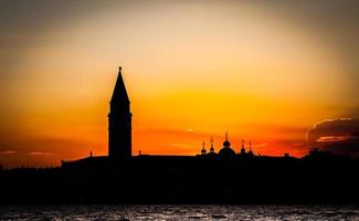 puesta de sol en venecia, italia foto