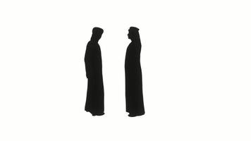 las siluetas de dos árabes en dishdasha handura están hablando entre sí. video