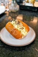 Bun or bread with scrambled eggs and truffle mushroom photo