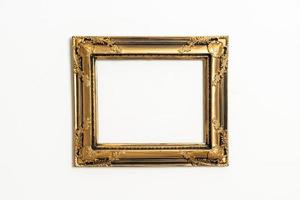 Empty picture frame on white wall background with copy space photo