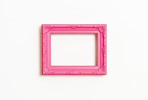 Empty picture frame on white wall background with copy space photo