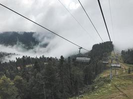 The cable car in Caucasus mountains. Sochi area, Roza Khutor, Russia photo