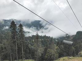 The cable car in Caucasus mountains. Sochi area, Roza Khutor, Russia photo