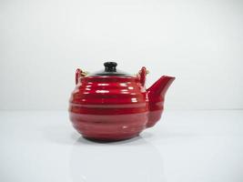 Red Chinese teapot on white background