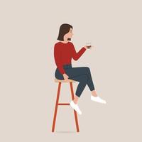 Women drinking coffee and sitting on bar stools vector