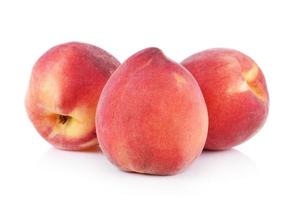 Peach with isolated on white background photo