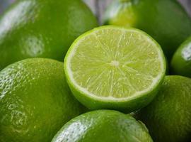 Lime on wooden table photo