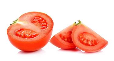 Slice tomato on white background photo