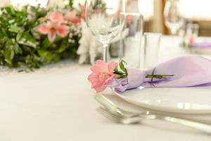 Beautiful floral compositions in the restaurant for the wedding ceremony photo