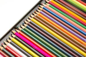 Coloured pencils in a box photo