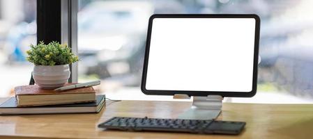 Blank screen laptop computer in modern office photo