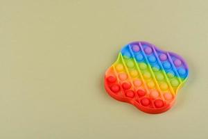Bright colorful children's toy made of silicone designed to relieve stress