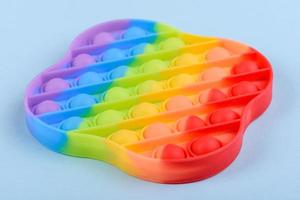 Bright colorful children's toy made of silicone designed to relieve stress