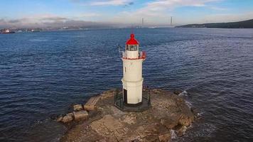 White lighthouse with red roof on Tokarev cat. photo