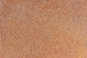 Brown textured background of a rusty metal surface photo