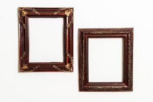 Empty picture frame on white wall background with copy space photo