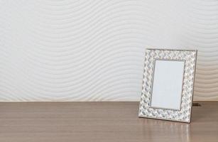 Empty picture frame decoration on white wall with copy space photo