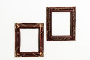 Empty picture frame on white wall background with copy space photo