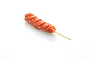 Fried sausage skewer isolated on white background photo