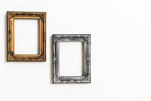 Empty picture frame on white wall background with copy space photo