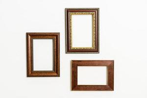 Empty picture frame on white wall background with copy space photo