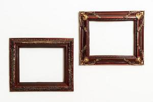 Empty picture frame on white wall background with copy space photo