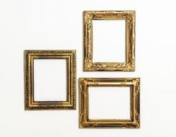 Empty picture frame on white wall background with copy space photo