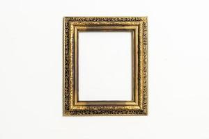 Empty picture frame on white wall background with copy space photo