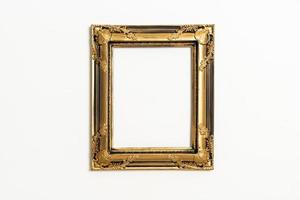 Empty picture frame on white wall background with copy space photo