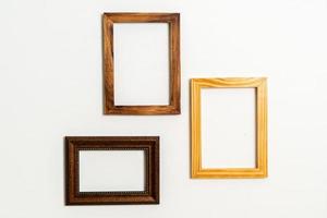 Empty picture frame on white wall background with copy space photo