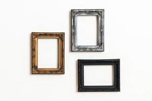 Empty picture frame on white wall background with copy space photo