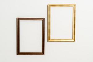 Empty picture frame on white wall background with copy space photo