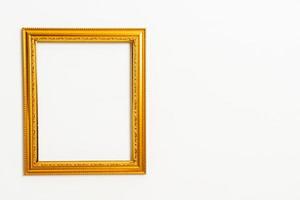 Empty picture frame on white wall background with copy space photo