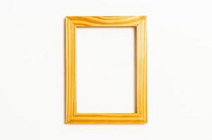 Empty picture frame on white wall background with copy space photo