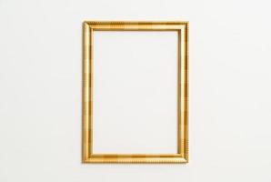 Empty picture frame on white wall background with copy space photo