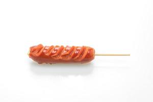 Fried sausage skewer isolated on white background photo