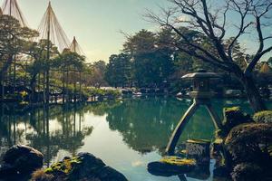 The Kotoji Toro, a two legged stone lantern in Kanazawa city, Japan photo